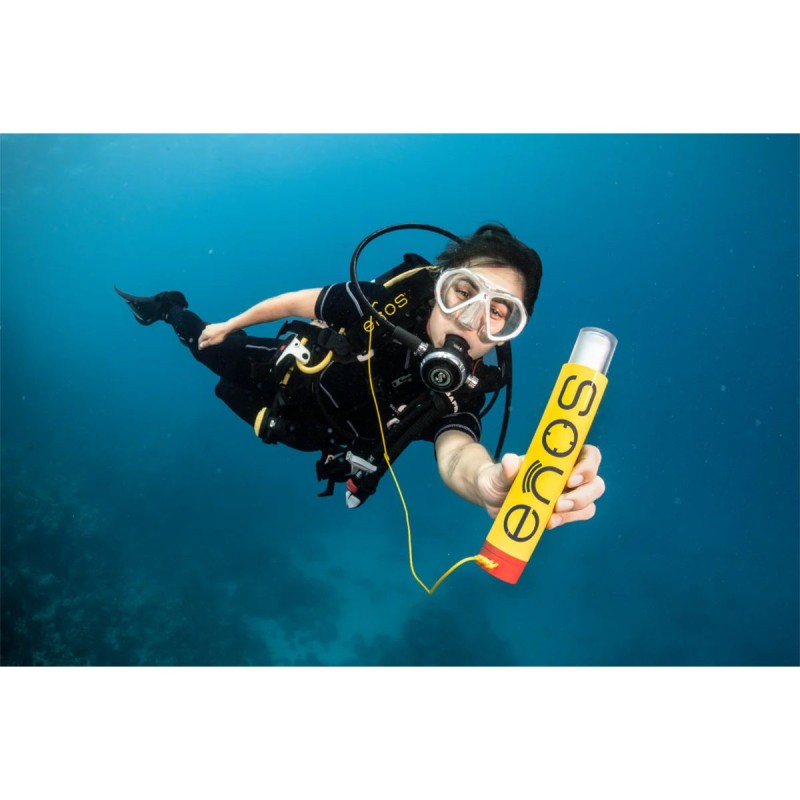 Female scuba diver equipped with ENOS autonomous safety system at sea